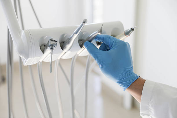 Professional Emergency Dentist technician working in Menominee, MI